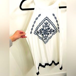 White embroidered navy halter dress